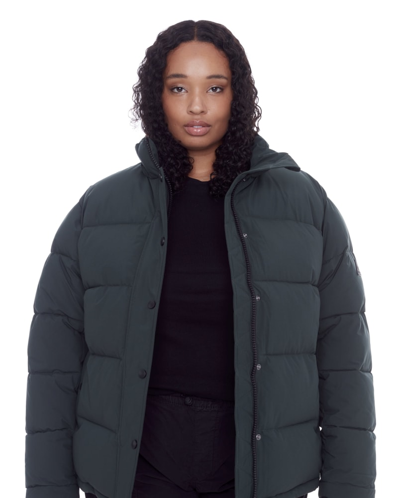 Front of a model wearing a size 1X Women's Plus Size - FORILLON | Vegan Down Recycled Short Quilted Puffer Jacket in Deep Green by Alpine North. | dia_product_style_image_id:320665